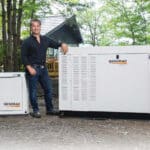 Platinum President Adam Wachtel Standing in Front of Home Standby Generators